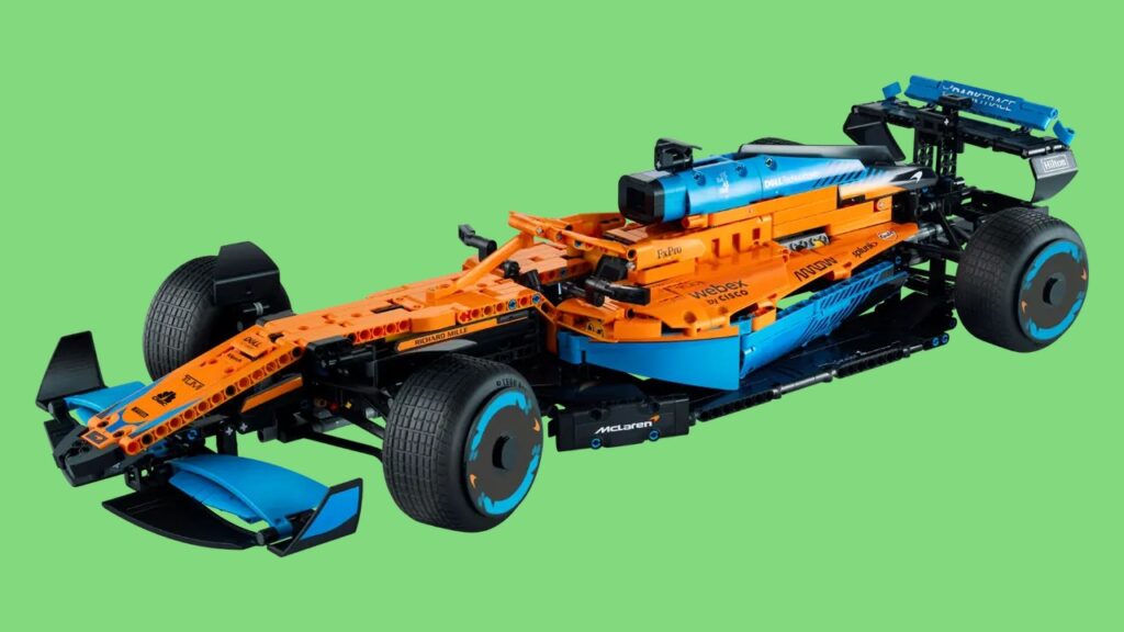 The LEGO Technic McLaren F1 2022 against a green background.