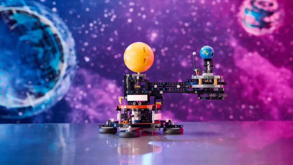 The LEGO Technic Planet Earth and Moon in Orbit against a cosmic background.